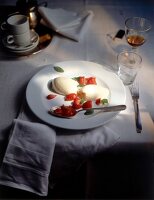 White chocolate mousse with berries on plate