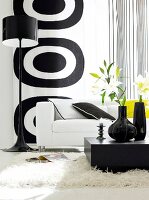 Living room with black and white walls and furniture