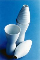Porcelain vases against blue background
