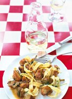 Pappardelle with veal, sweetbreads and artichokes on plate