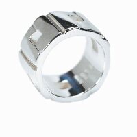 Close-up of silver ring on white background