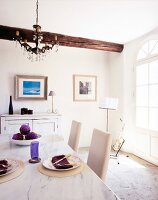 Bright dining area with chandelier in dinning room