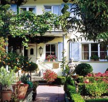 Entrance of Hotel Villino with garden, Idyll, New Zealand