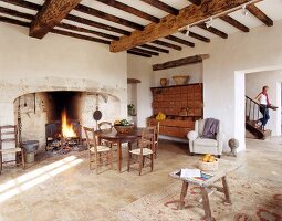 Large fireplace in old house living room