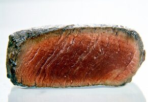 Close-up of half raw steak