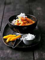 Shrimp and mango curry in bowl