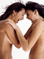 Two naked women shouting at each other