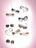 Variety of sunglasses hanging
