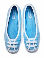 Blue ballerina shoes on white background
