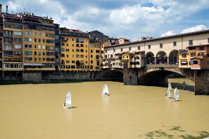 View of Ponte Vecchio bridge over Arno river in Florence, Italy