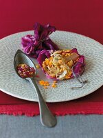 Lamb and red cabbage wrap with onion sauce and lentils