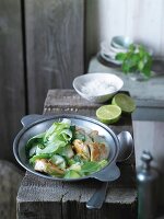 Chicken curry with coconut milk, courgettes and spring onions