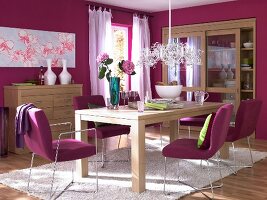 View of pink dining room with wooden furniture