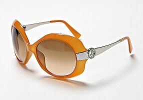 Sonnenbrille mit orangenem Rahmen, große Gläser, Armani