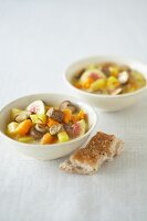 Lamb stew with figs, pumpkin and mushrooms