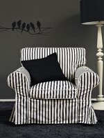 Black and white striped armchair with black scatter cushion