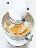 Close-up of cake mix with cream in blender