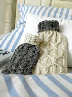 Close-up of knitted hot water bottle covers