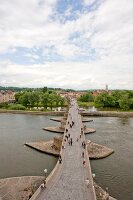 View of Stone Bridge over Danube river in Regensburg, Germany