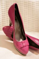 Close-up of pair of pink pumps