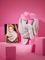 Woolen scarf with photo on pink background