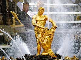 View of Peterhof Grand Cascade fountain with bronze sculptures in St. petersburg, Russia