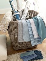 Close-up various blue fabrics in basket