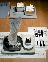 Porcelain tray with plate, sugar stars, cutlery and music notes