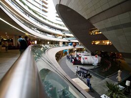 People at futuristic architectured Kanyon shopping mall in Istanbul, Turkey