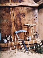 Gardening tools on wooden wall
