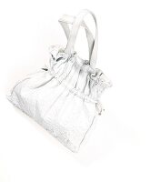 Plain white leather bag on white background