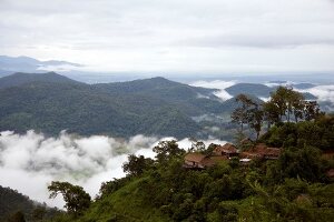 View of mountain landscape and forest village with fog, Huei Kut Chap, Udonthani, Thailand