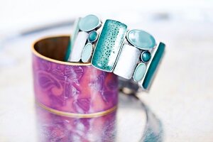 Close-up of turquoise enamelled stone bracelet