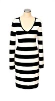 Close-up of striped and knitted black-white dress on mannequin