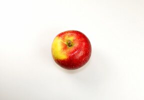 Close-up of apple on white background