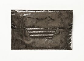 Gray clutch with snakeskin look on white background