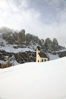 View of Chapel at the Gardena pass in front of the Sella Group, South Tyrol, Italy