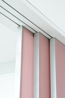 Close-up of pink sliding wall