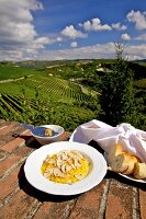 Tajarin and white alba truffle on plates at Piedmont, Italy