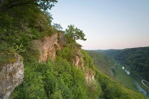 View of river and mountains in Nature Park, Franconian Switzerland, Bavaria, Germany