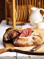 Ham wrapped in bread dough with caraway, fennel and coriander