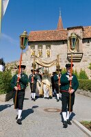 Procession on road in Franconian Switzerland, Bavaria, Germany