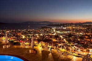 View of restaurant Tuti in Mamara hotel with cityscape at night in Istanbul, Turkey