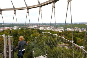 Man and woman climbing downstairs from Killesbergturm at Stuttgart, Germany