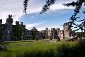 View of Ashford Castle with pavement and garden, Ireland, UK