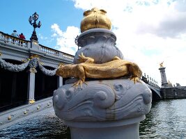 Details of statue on Pont Alexandre III over Seine river in Paris, France