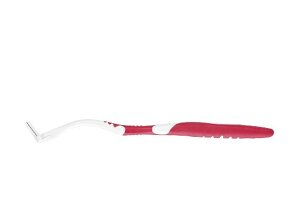 Interdental brush with handle on white background