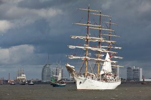 Gorch Fock sailing in sea near Atlantic Hotel Sail City in Bremerhaven, Bremen, Germany