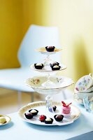 Petit fours and pralines on a homemade cake stand