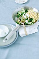 Linguine with a spinach medley and ricotta in a pan